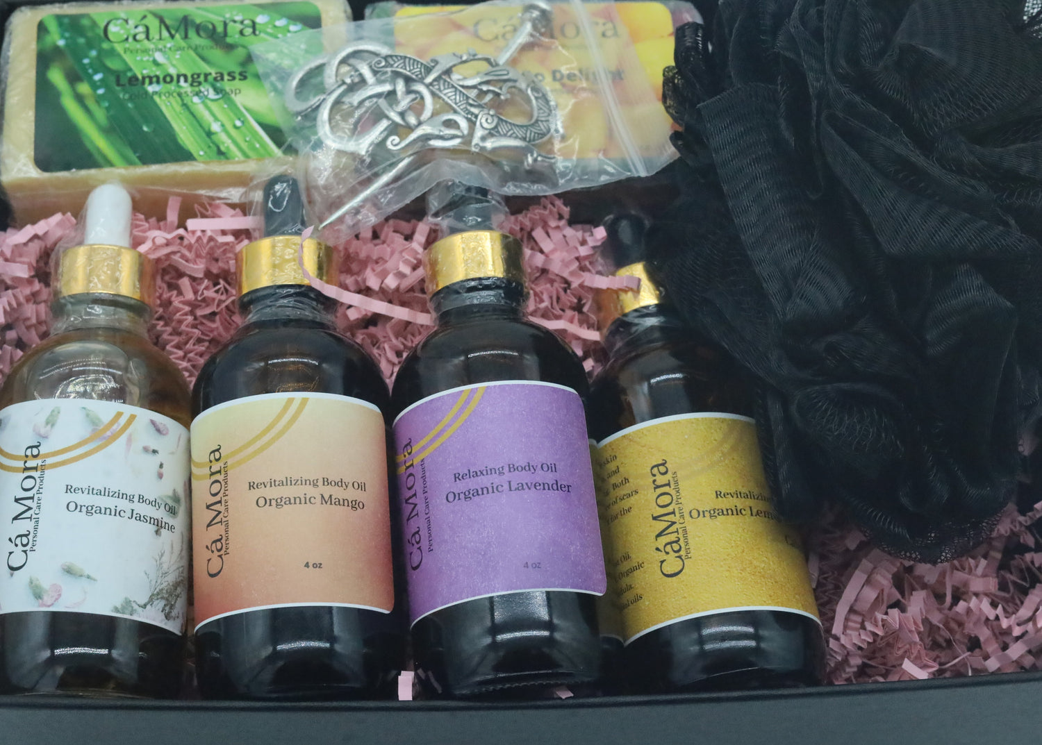 Ca'Mora Organic Body Oil Bundle with soap, sterling silver hair pin, and shower scrub.