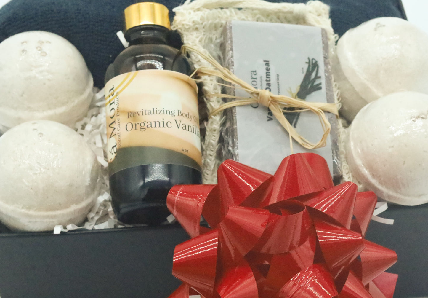 Ca'Mora Vanilla body oil and bath bomb set.