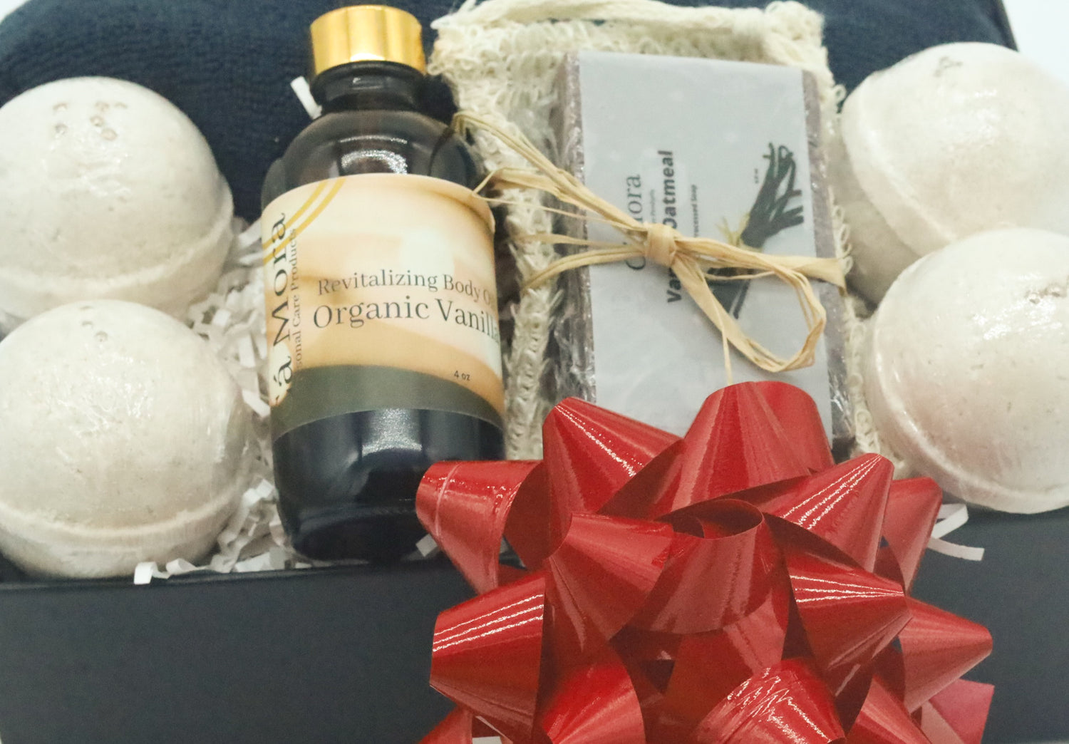Ca'Mora Vanilla body oil and bath bomb set.