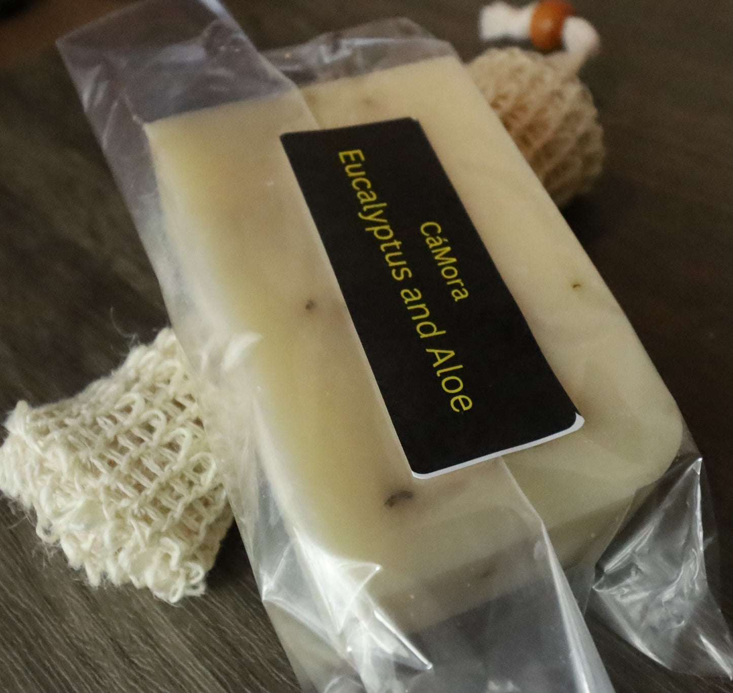 Ca'Mora eucalyptus aloe shea butter soap labeled with soap saver.