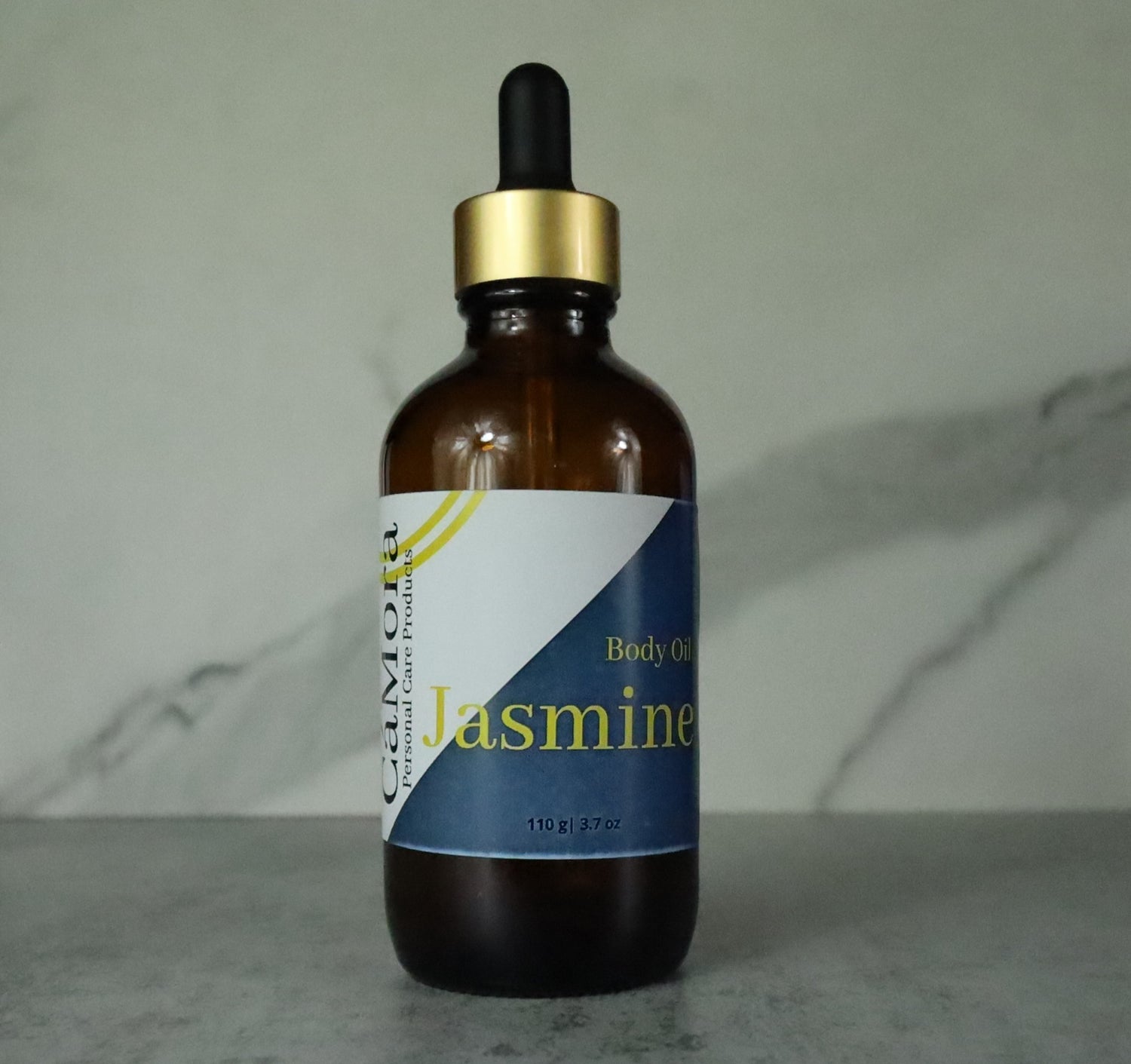 Ca'Mora organic jasmine body oil.  4 ounce collage of bottles.  Infused with organic jasmine leaves.