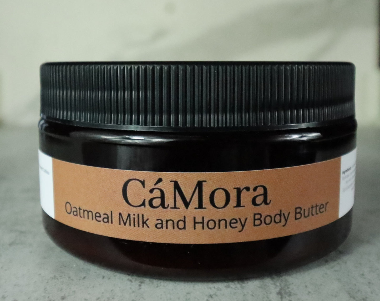 Ca'Mora Oatmeal Milk and Honey Body Butter for moisturized skin.
