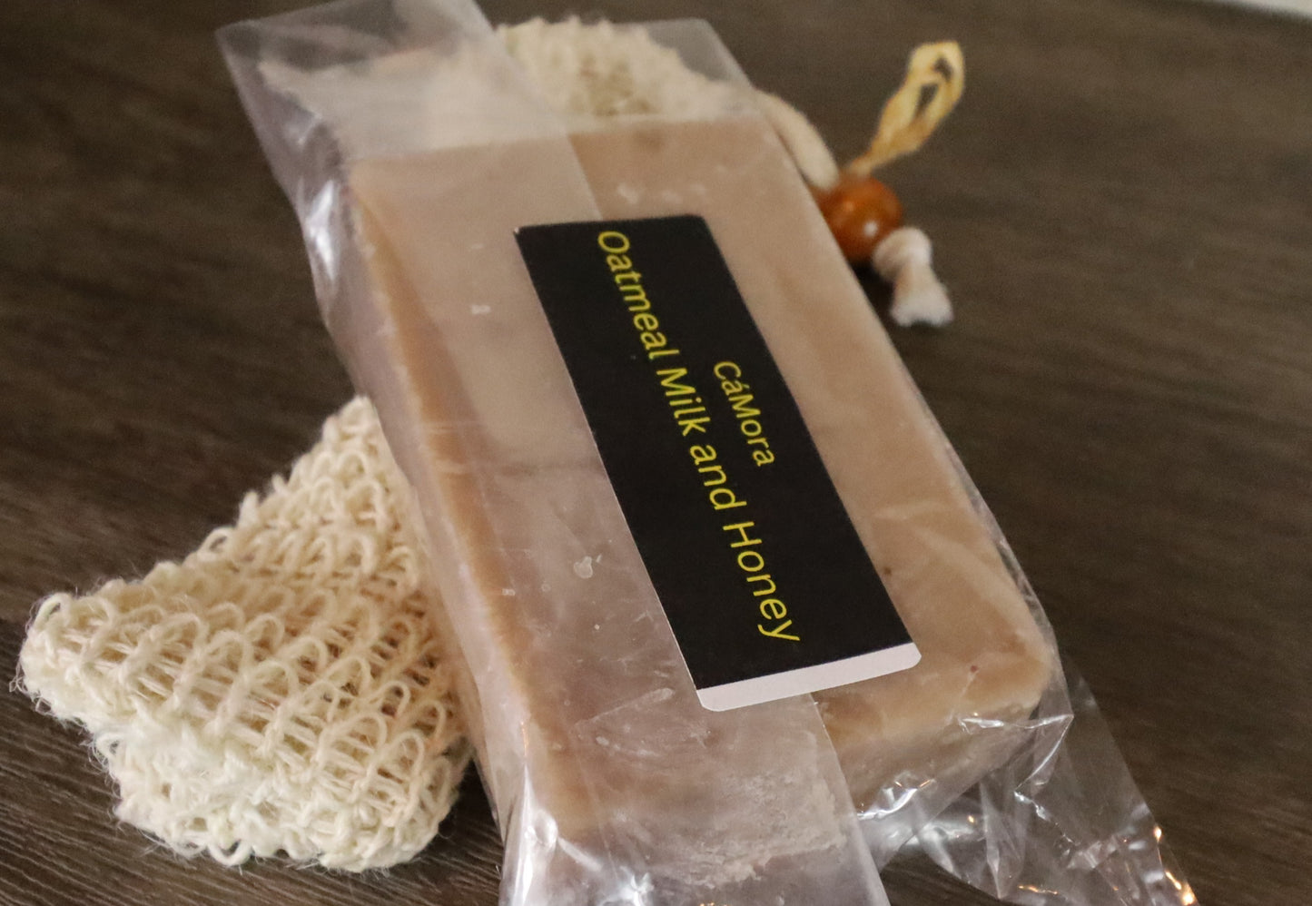 Ca'Mora Oatmeal Milk and Honey shea butter soap with label for soft skin.
