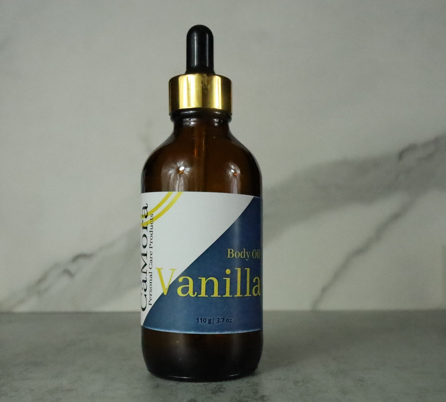 Vanilla Organic Body Oil, 4 ounces, infused with a proprietary blend of essential oils to promote moisturized skin.