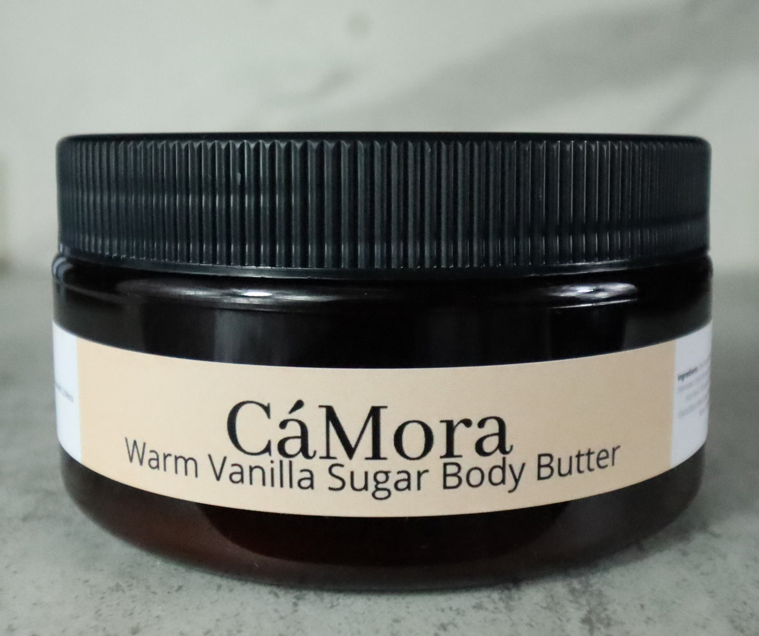 Warm Vanilla Sugar body butter for moisturized skin.